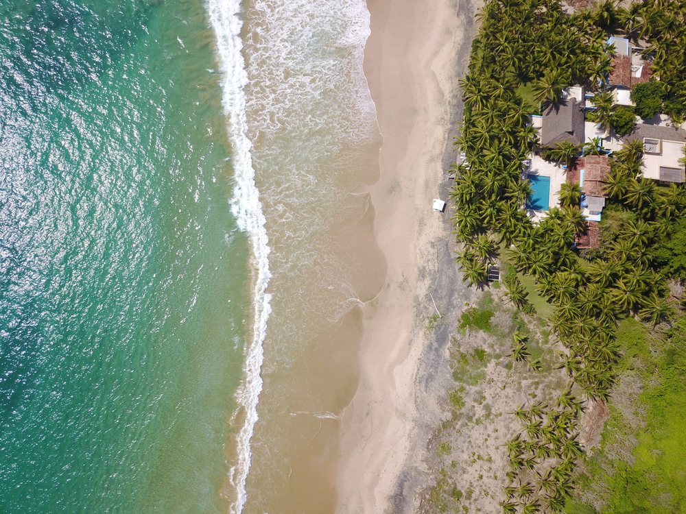 Aerial of the beach and house