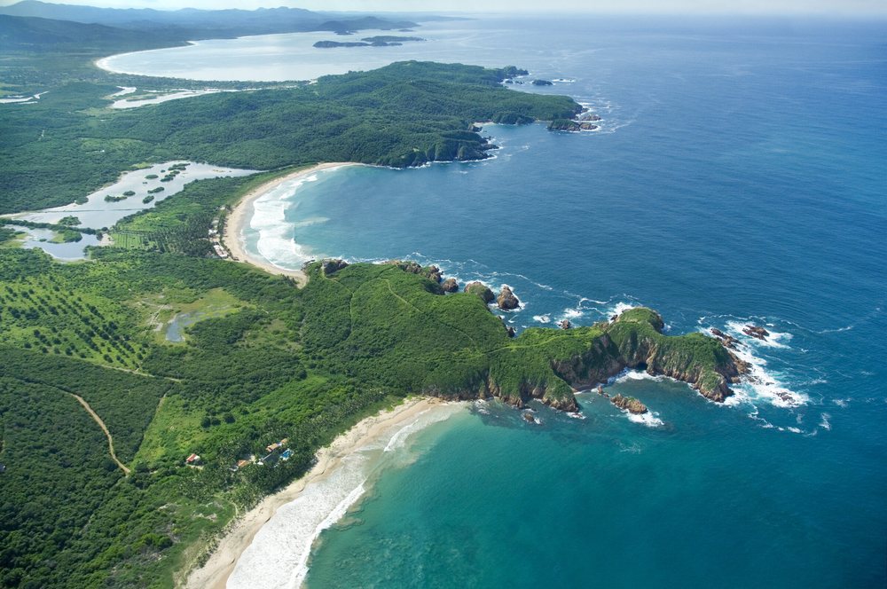 Aerial of the beach and the coast beyond